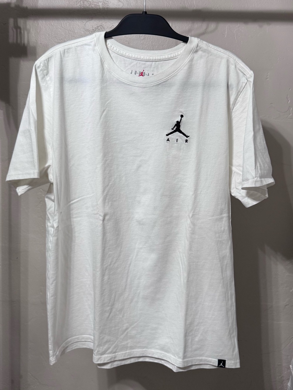 Jordan White Short-Sleeve Tee with Black Embroidered Jumpman Logo